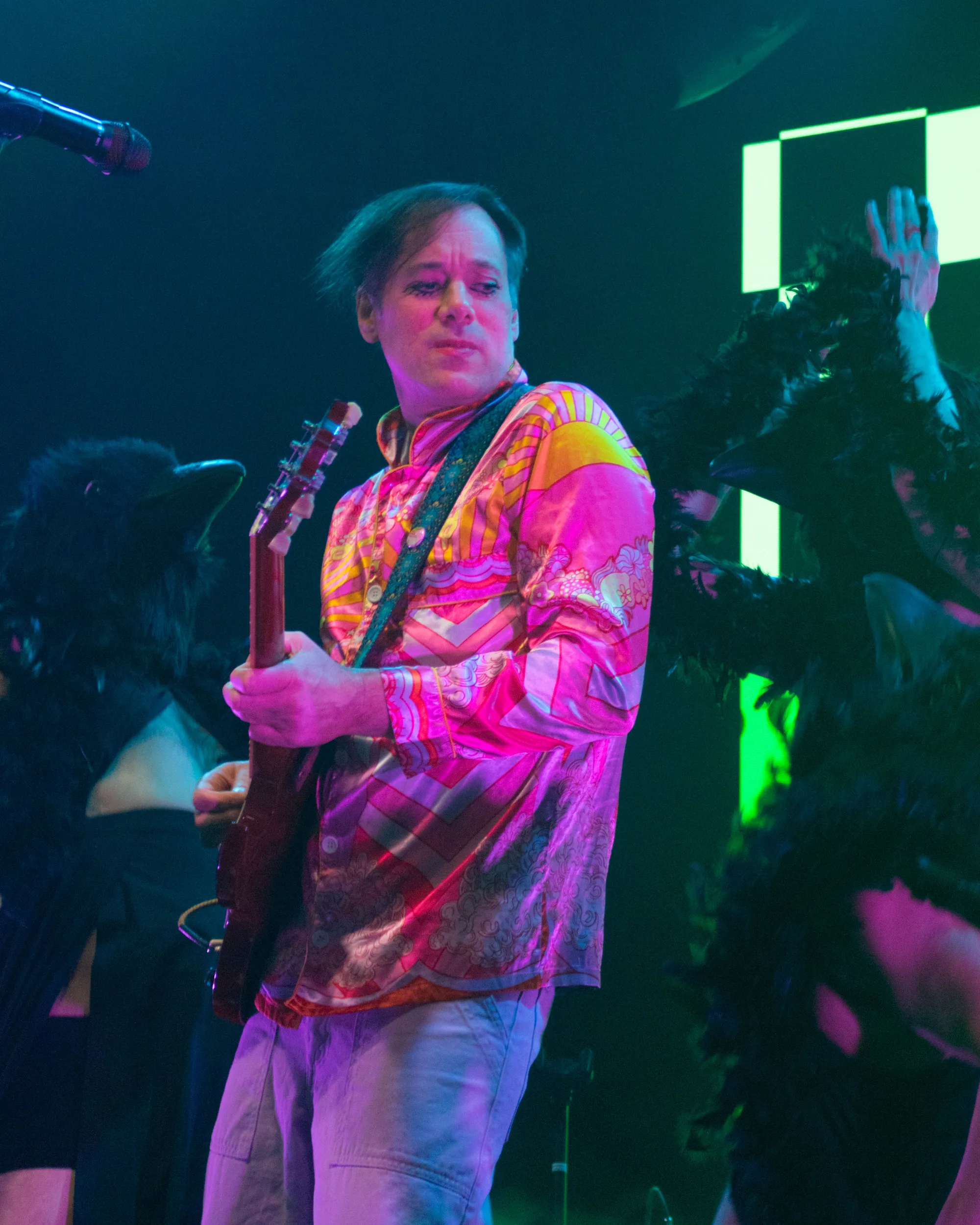 of Montreal singer Kevin Barnes playing guitar